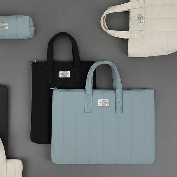 Personalised polyester laptop briefcase in black, shown next to matcha and sky blue colour options.