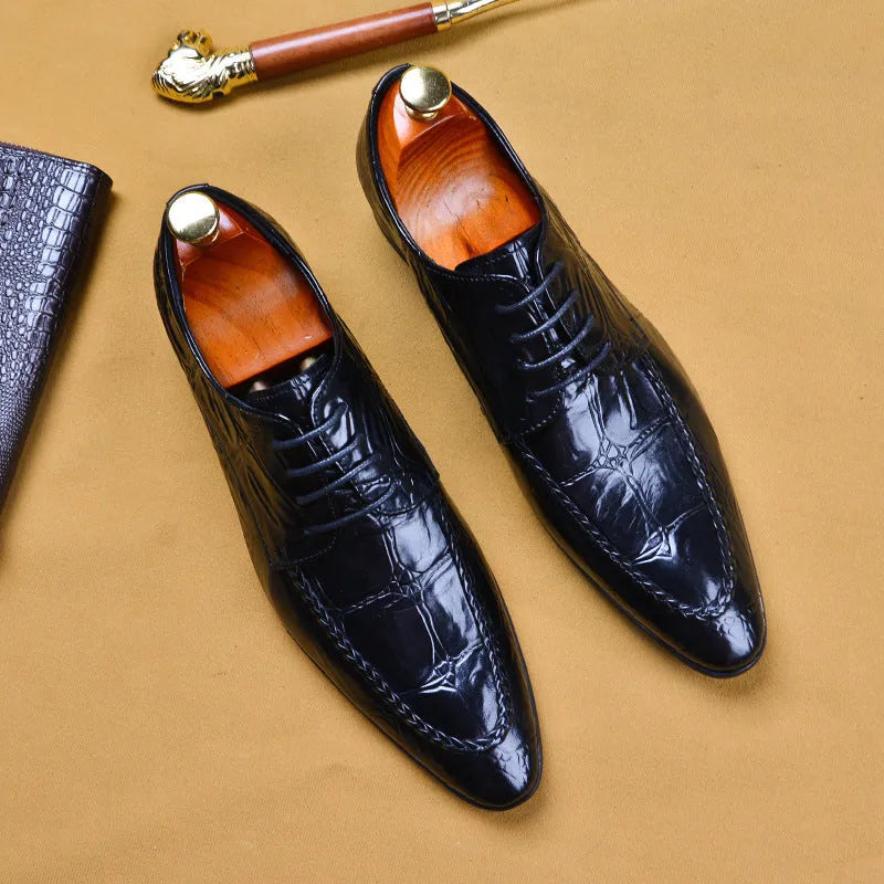 Men's black leather business shoes with alligator pattern texture and a gold horse bit buckle.