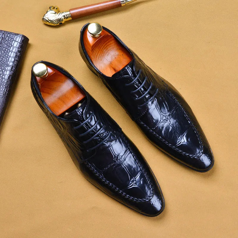Men's black leather business shoes with alligator pattern texture and a gold horse bit buckle.