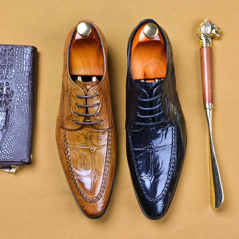 Men's black leather business shoes with alligator pattern texture and a gold horse bit buckle.