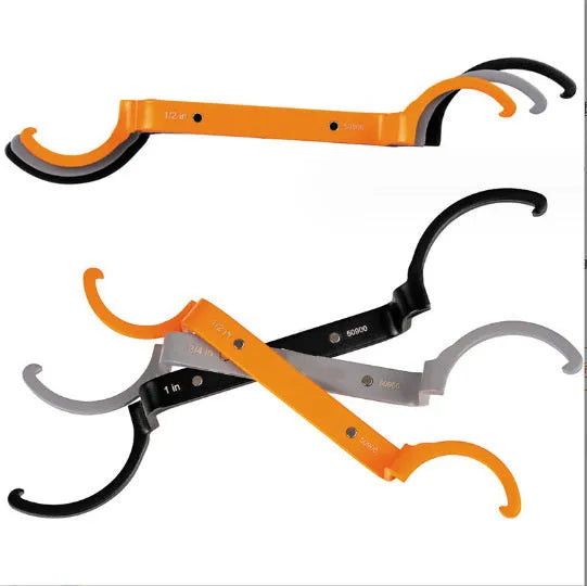 Three magnetic crescent wrenches in orange, grey, and black with locking mechanism and suction feature