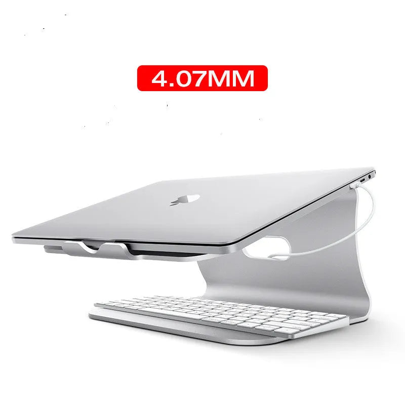 Silver aluminium laptop cooling bracket with rotary base on a wooden desk