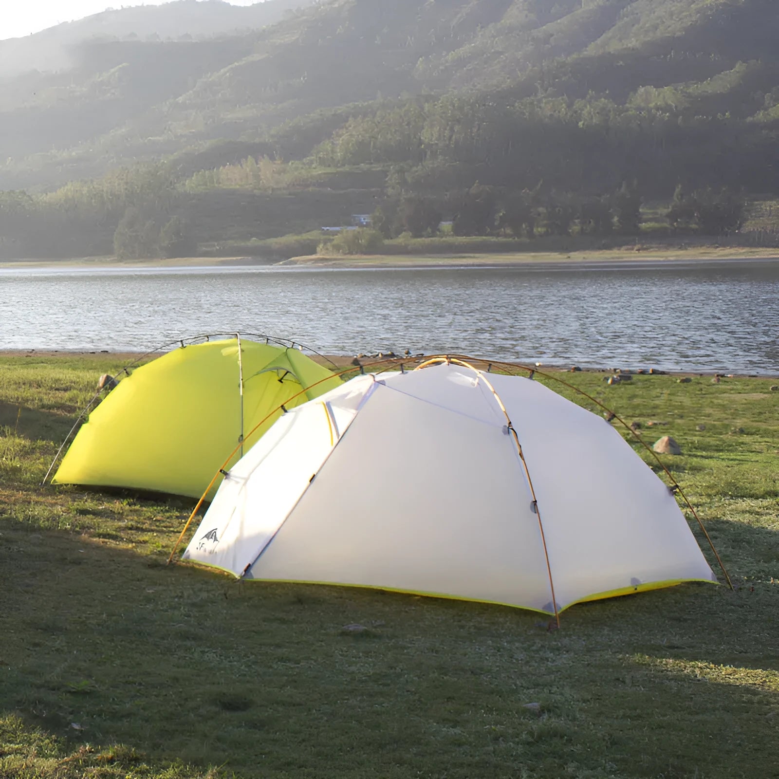 Green camouflage double layer camping tent with two room one hall layout set up outdoors