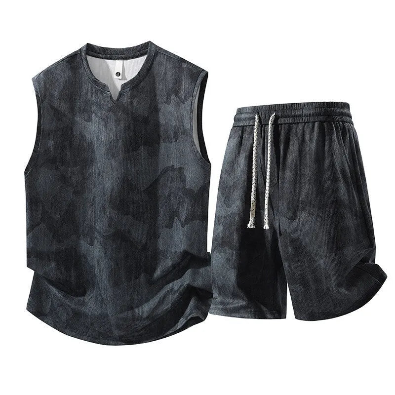 A plus-size casual sleeveless vest and shorts suit set in quick-dry fabric on a hanger.
