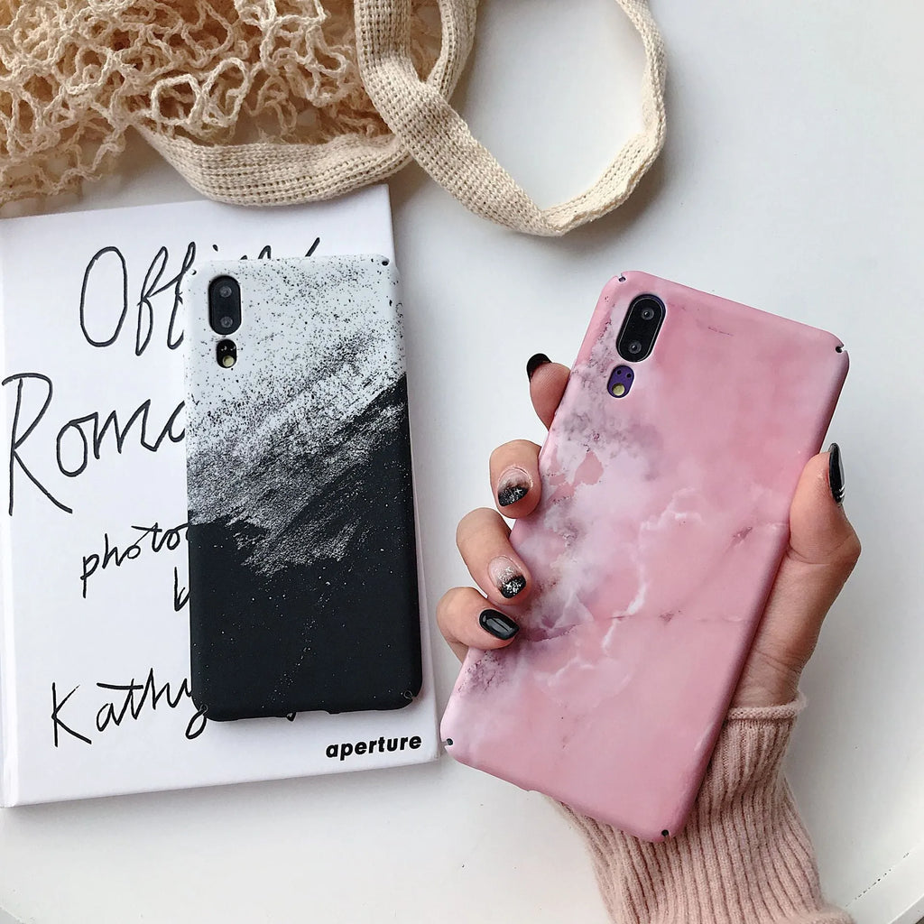 Painted pure colour black and pink phone back cover cases for Huawei models on a white background.