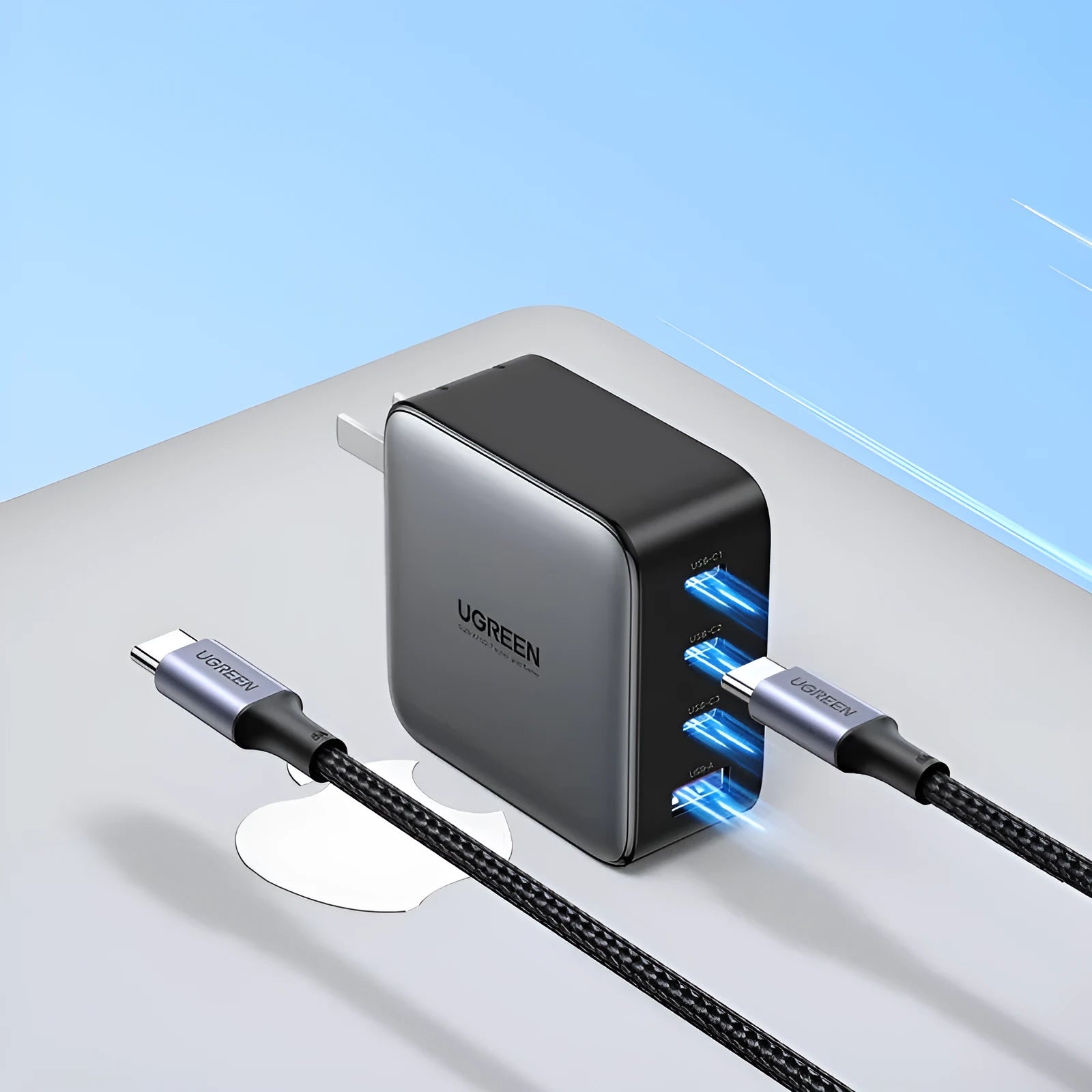 Compact 100W Gallium Nitride GaN fast charger plug with USB-C port on a 69mm body.