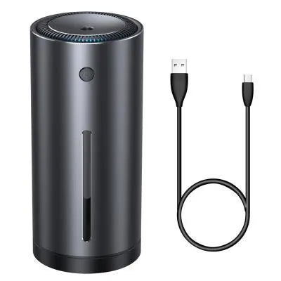 Black aluminium alloy car humidifier and air purifier with USB cable on a car dashboard.