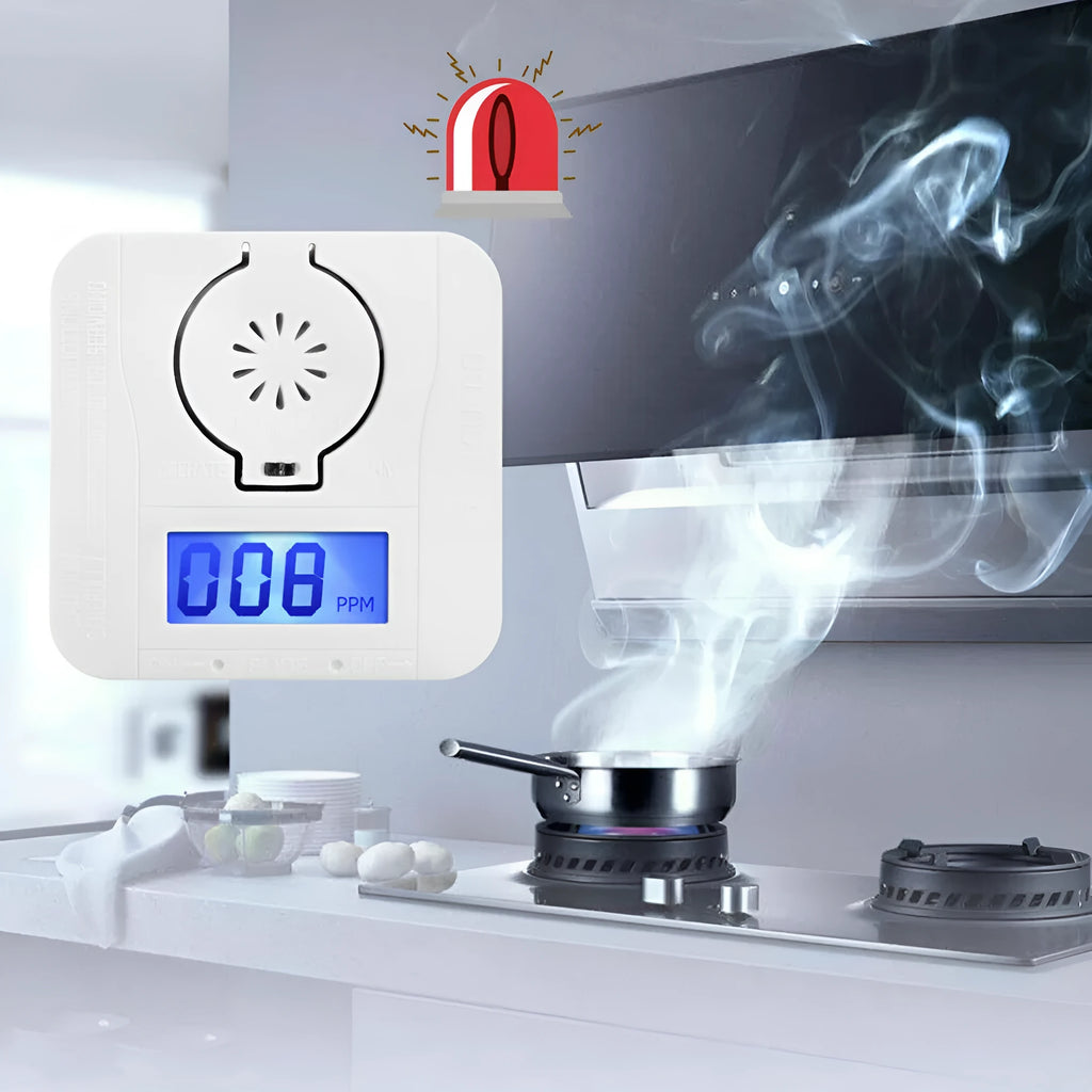 White wireless carbon monoxide alarm mounted on a wall for detecting coal and soot gas.