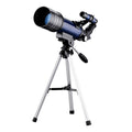 Dark blue 70mm refractor telescope on a table with finder scope and two eyepieces for moon watching
