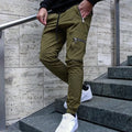 Men's zipper multi-pocket loose fit trousers in black, 95% polyester chemical fiber blend, with belt and small leg opening