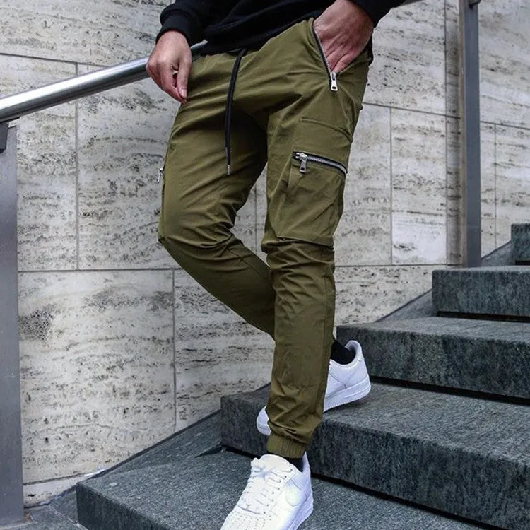 Men's zipper multi-pocket loose fit trousers in black, 95% polyester chemical fiber blend, with belt and small leg opening