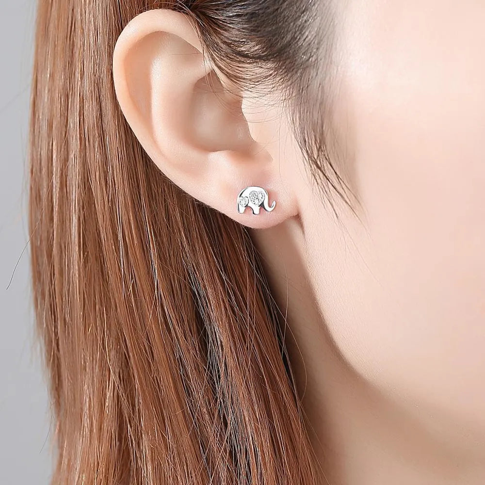 Geometric silver earrings with gem setting measuring 0.6cm by 0.9cm