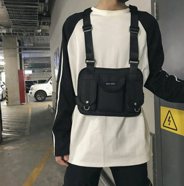 Nylon casual sports backpack in black with curved shoulder straps and plain finish, 20-35L capacity