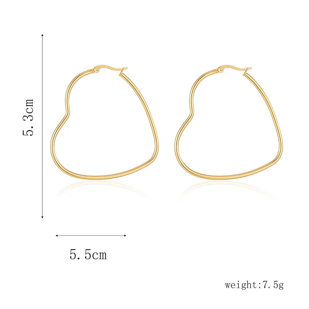 Golden metallic heart-shaped ear clip for women made from twisted electroplated stainless steel