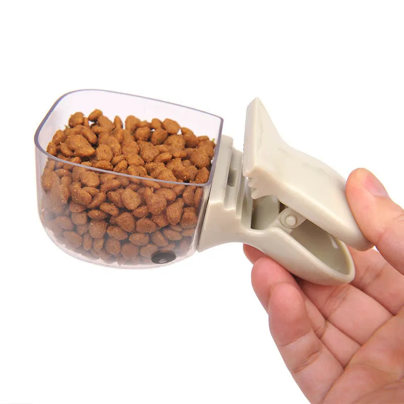 Cat food seal fresh-keeping clip with scoop and belt clip on an opened bag