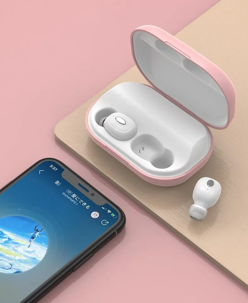 Wireless Bluetooth headset with charging case in blue and pink on white background