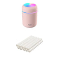 Pink, white, and navy blue USB mini silent humidifier with LED lights on a desk