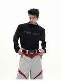 Black mesh slim-fit long sleeve bottoming shirt on a hanger, showing its lightweight texture and close cut.