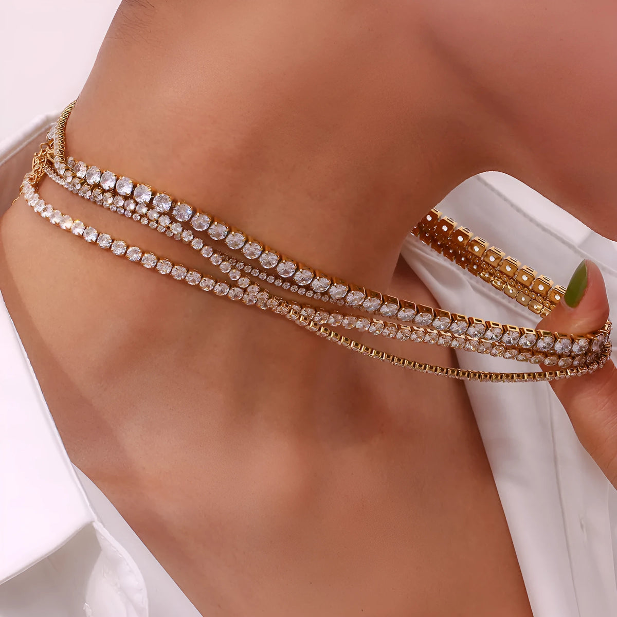 Stainless steel zircon necklace and bracelet set with 2-5mm stones and gold or silver titanium steel pendant