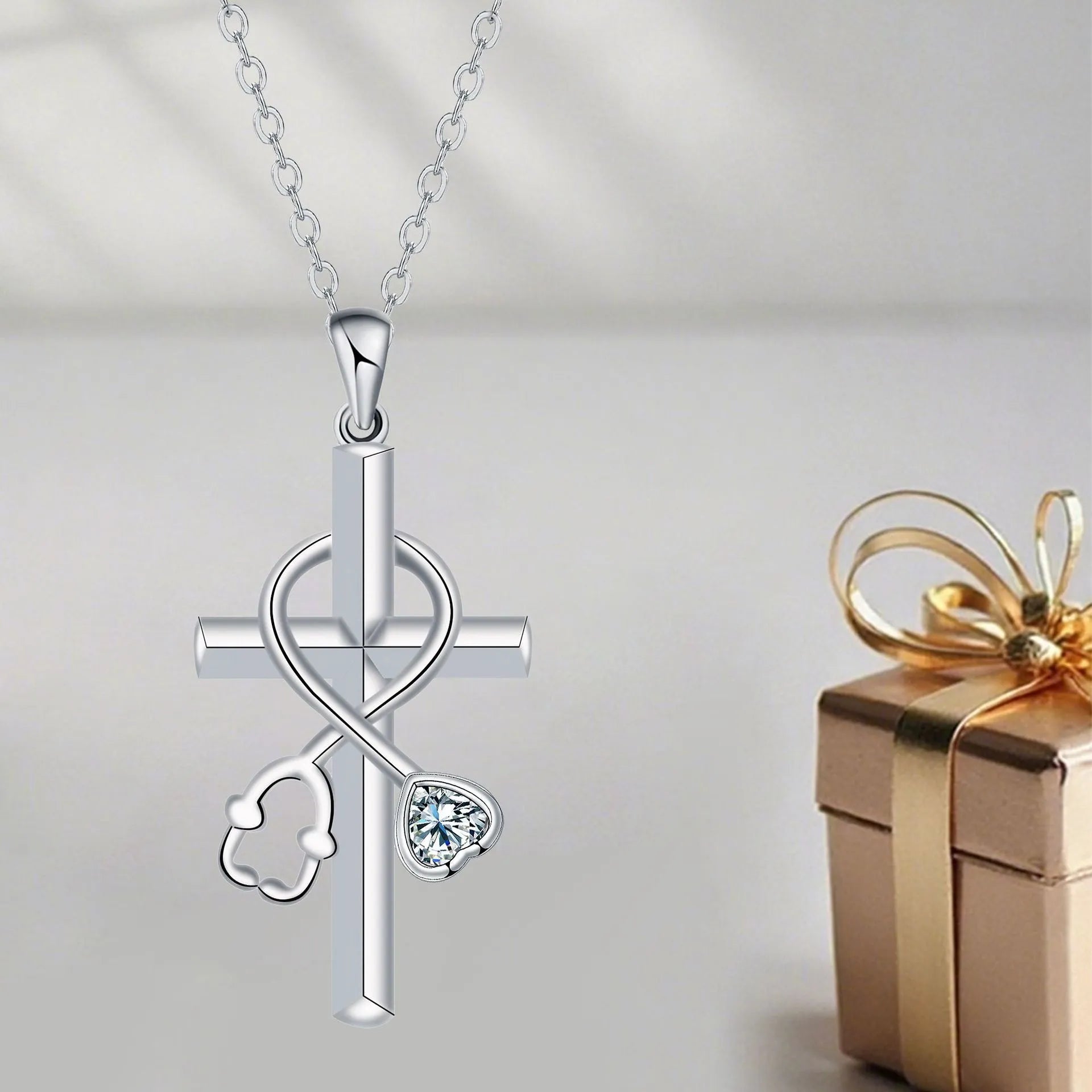 Women's necklace with copper stethoscope pendant on cross chain, electroplated finish