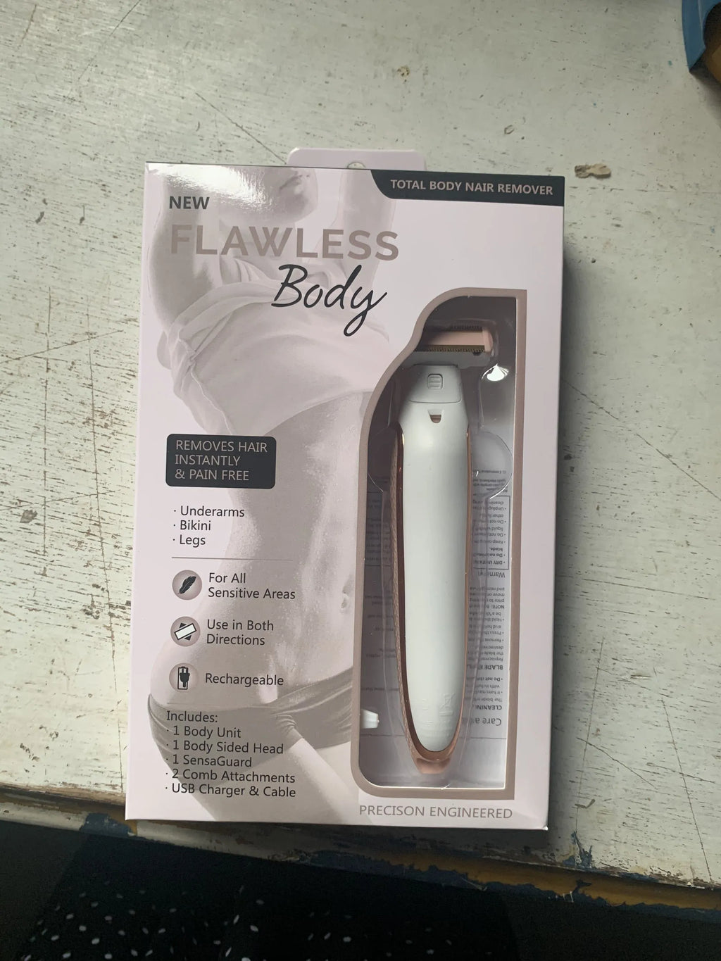 White ABC electric whole body shaver for men and women, cordless and rechargeable, on a plain background