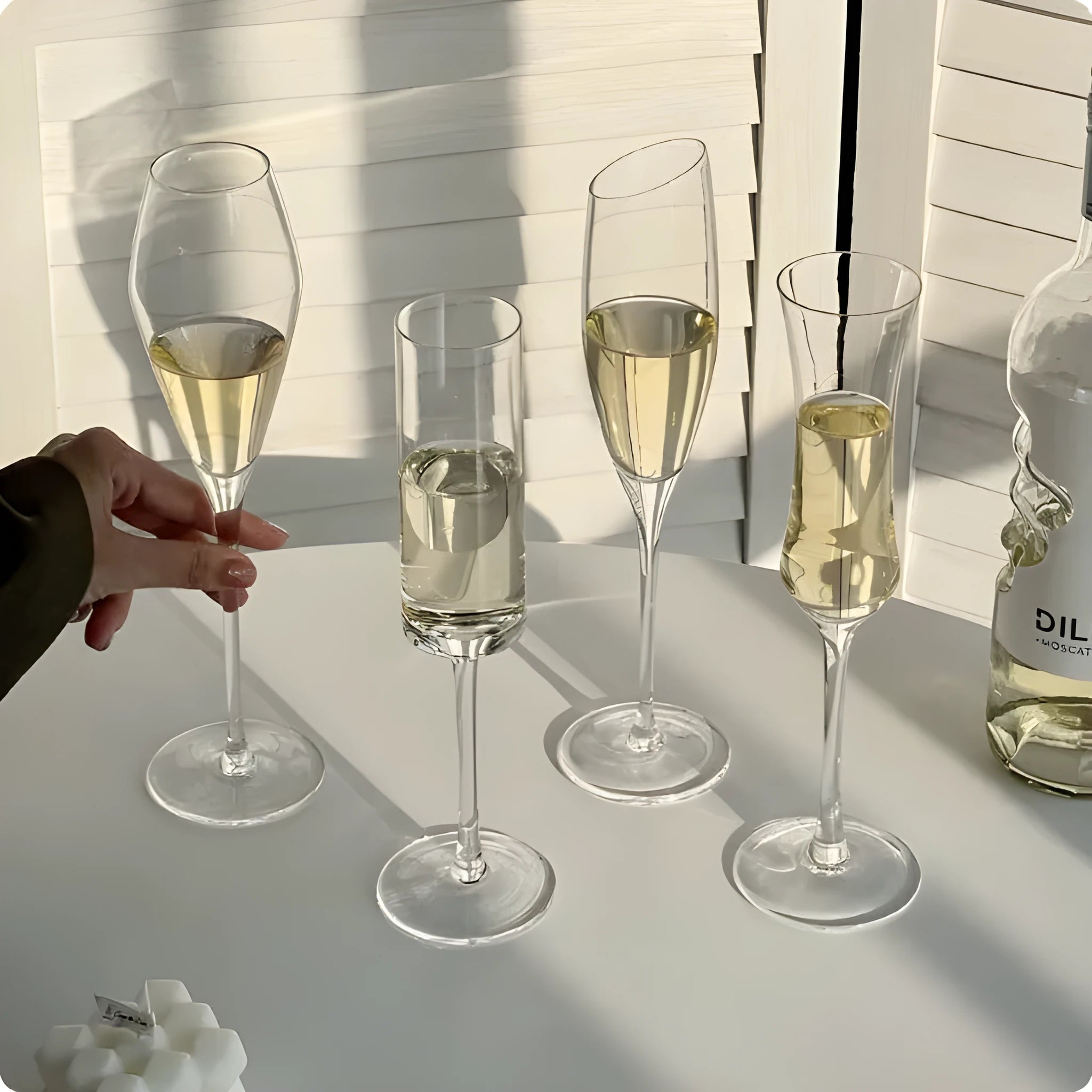 Clear glass French champagne goblet in one of seven styles: flute, tulip, waist, bevel, era or coupe.
