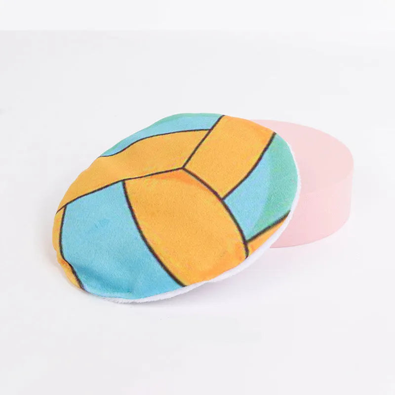 Catnip flying disc toy with sports ball pattern, plush exterior, and crinkle sounds for indoor cats