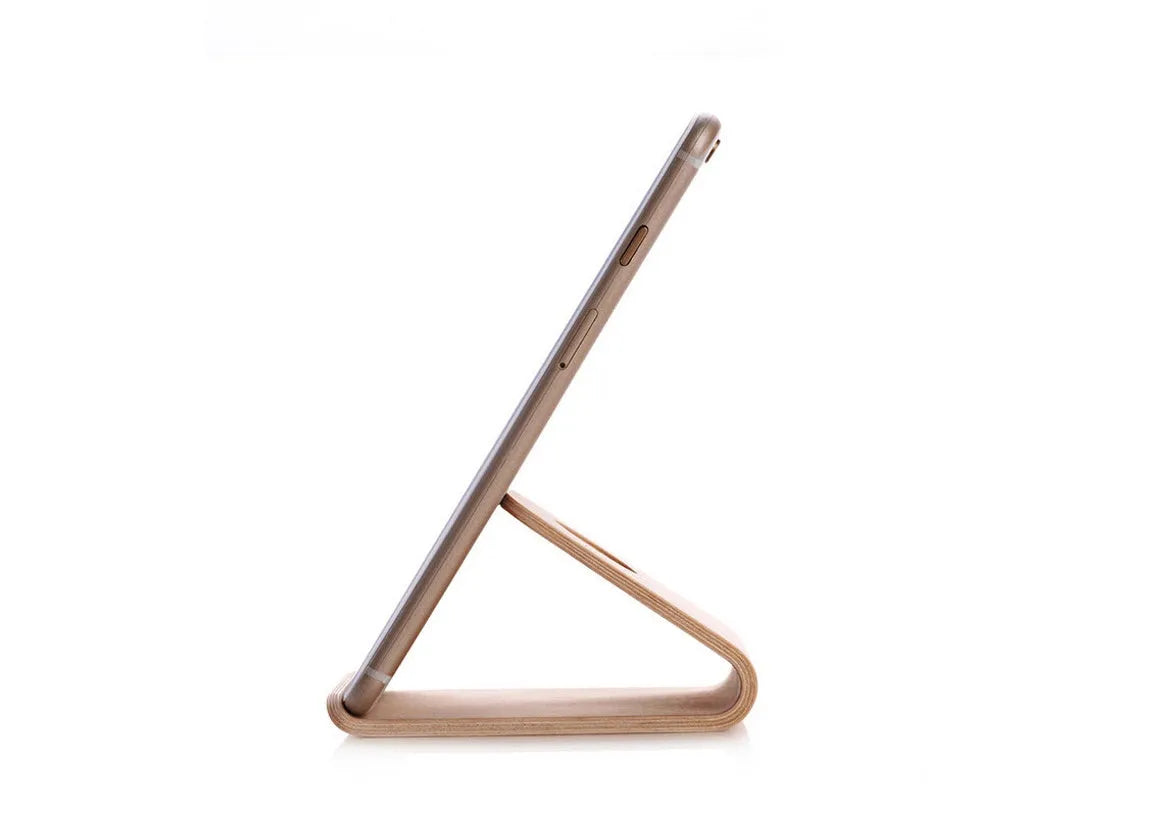Wooden iPhone stand in walnut finish holding an Apple iPhone
