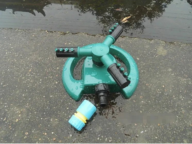 360 rotating garden sprinkler with three-fork base, 210mm x 190mm x 95mm, sprays up to 3m high and 5m wide