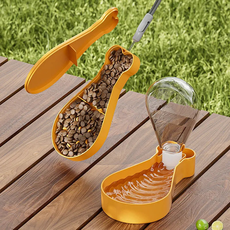 Orange and white portable pet water feeder bottle with attached food container for dogs and cats.