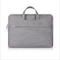 Waterproof denim laptop bag for 11.6 inch, 13.3 inch, and MacBook 12 inch, in denim blue or denim gray.