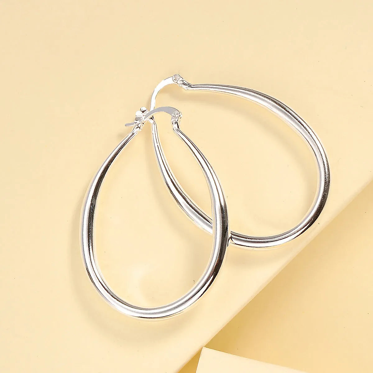 Geometric oval earrings for women, gold electroplated metal with alloy inlaid artificial gems