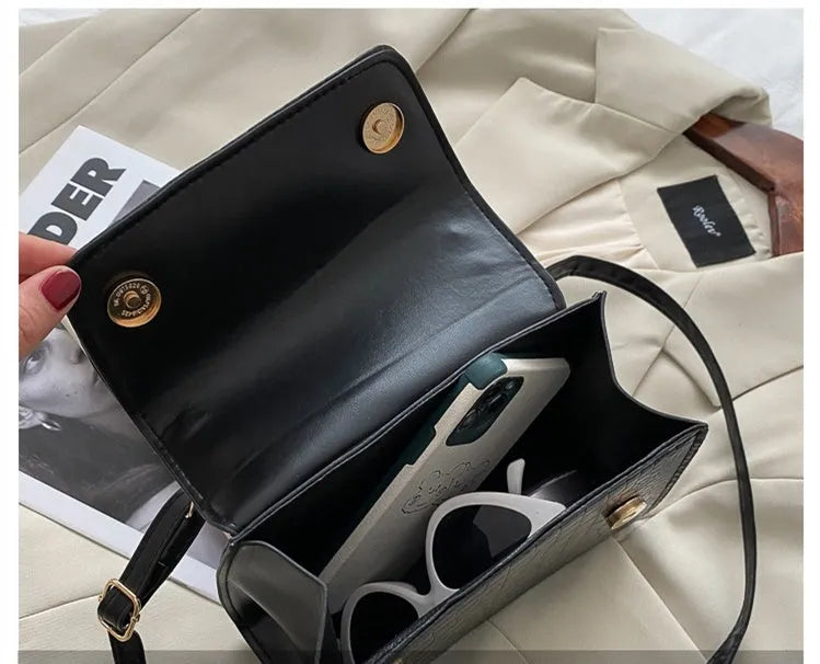 Women's small square retro armpit bag in black with stone pattern PU exterior and magnetic buckle
