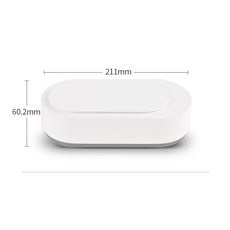White portable ultrasonic cleaning machine with stainless steel tank and digital timer display.