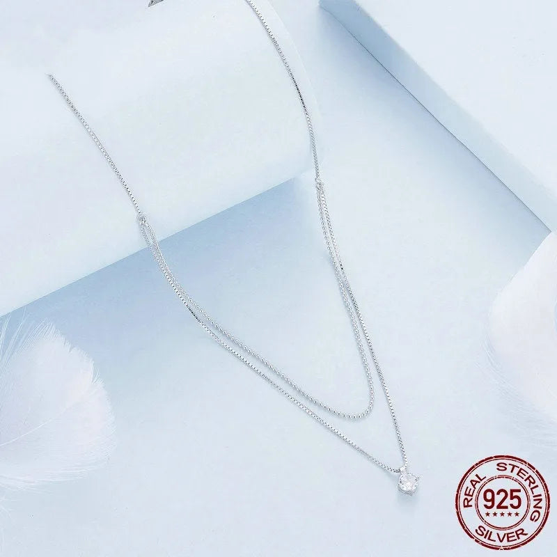 Women's double-layer sterling silver necklace with pearl chain and personality pendant