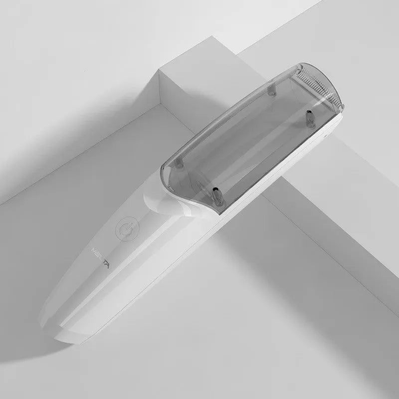 Baby suction electric hair clipper with ceramic blade, rechargeable and waterproof, in green colour