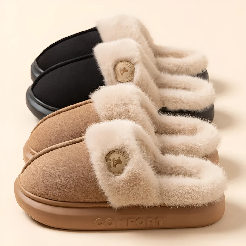 Pair of thick-soled plush fleece slippers for indoor winter wear, shown in a selected colour.
