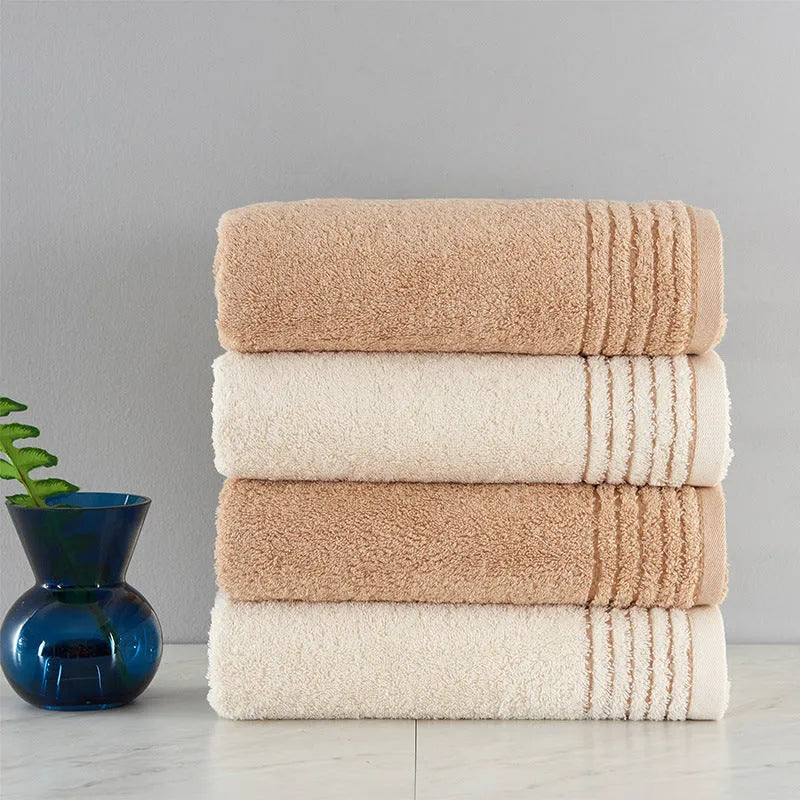 Six-piece cotton towel set showing bath, hand, and washcloth sizes in beige colour.