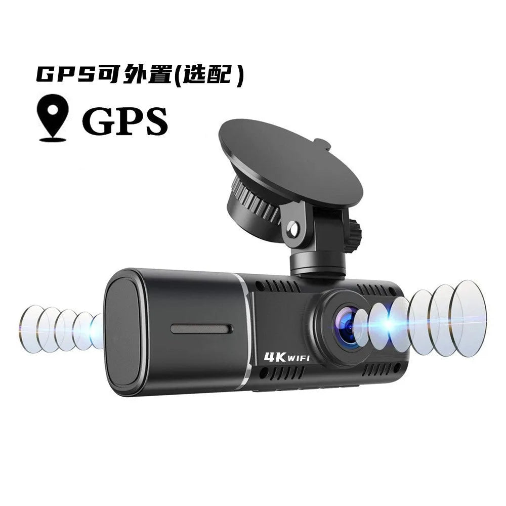 Black dual-channel car dash cam on windscreen mount with rear camera cable.