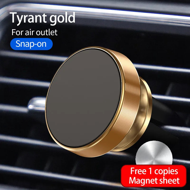 Black magnetic car phone holder attached to a car air vent, holding a smartphone at an angle.