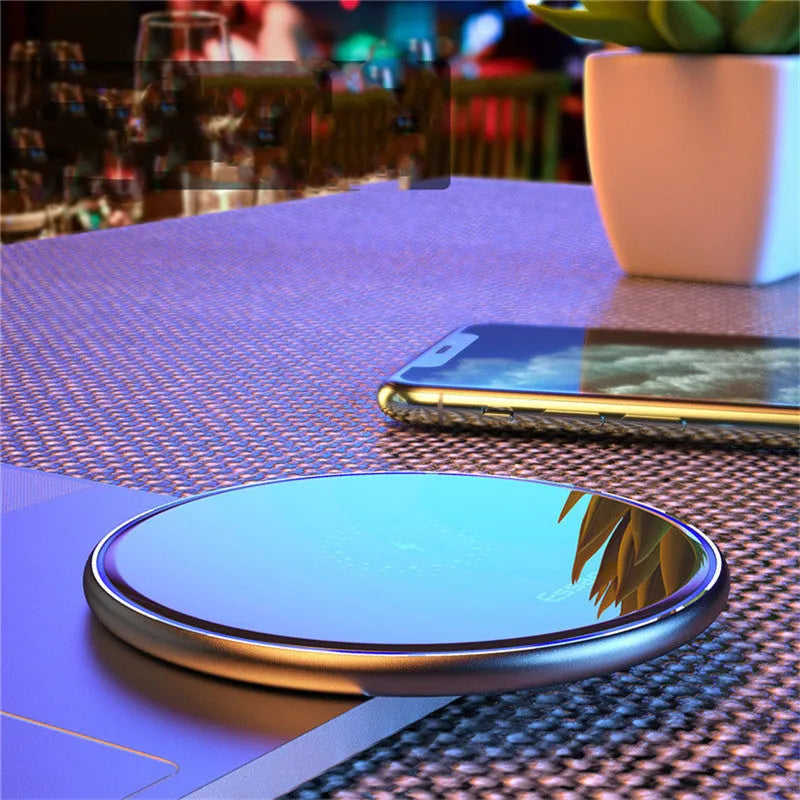 Black wireless charging pad with LED indicator for iPhone Samsung phones