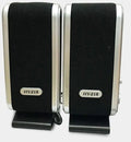 A black notebook mini speaker with a USB cable for computer audio.