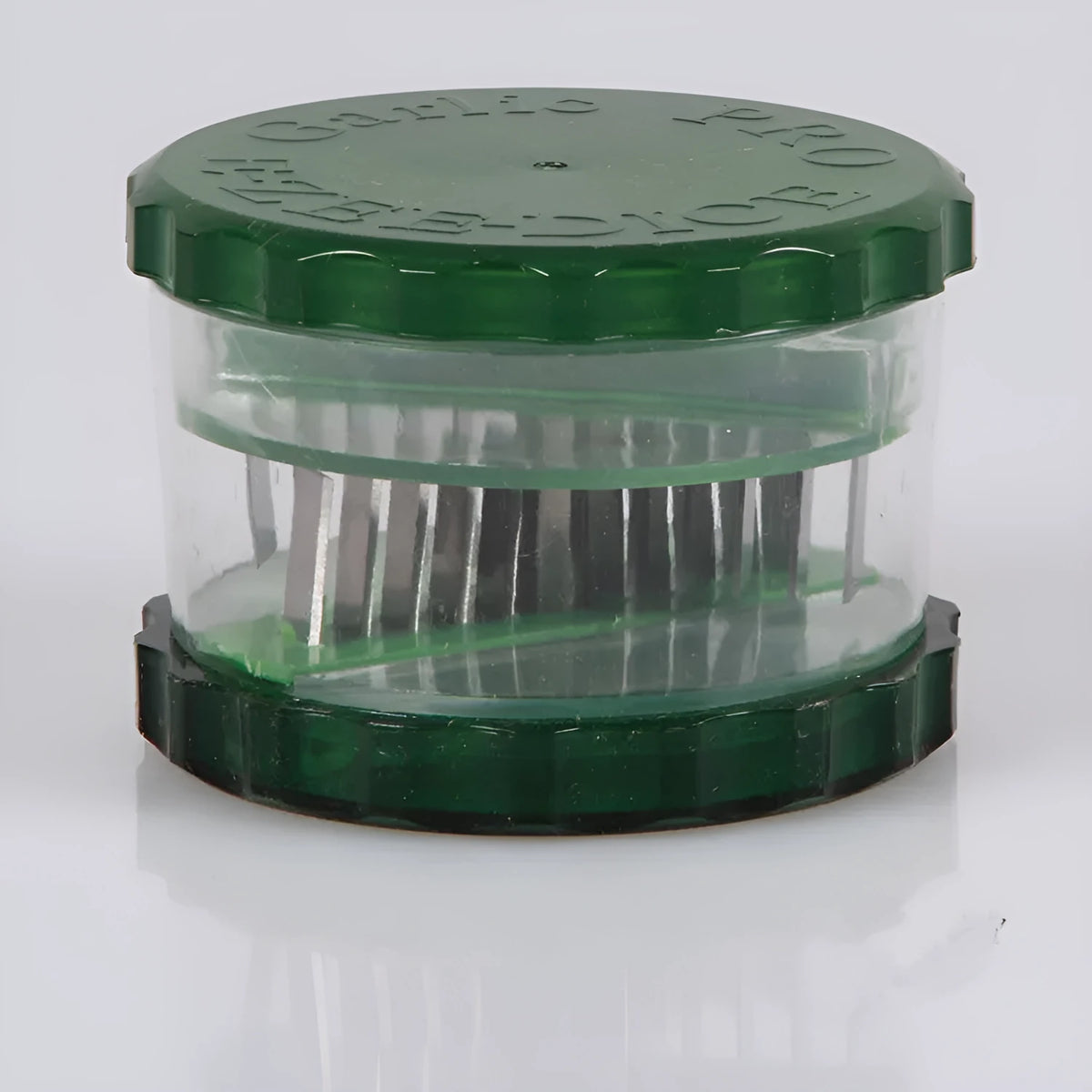 Green garlic peeler kitchen gadget made of transparent PP, measuring 8.5 x 8.5 x 6 cm