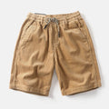 Men's retro American-style cargo shorts in khaki, white, or green polyester fabric