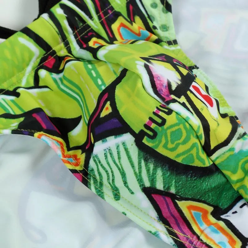 Men's printed polyester swim trunks in colour options ice cream, saibo, skull, streamer, sizes S to XL, front view