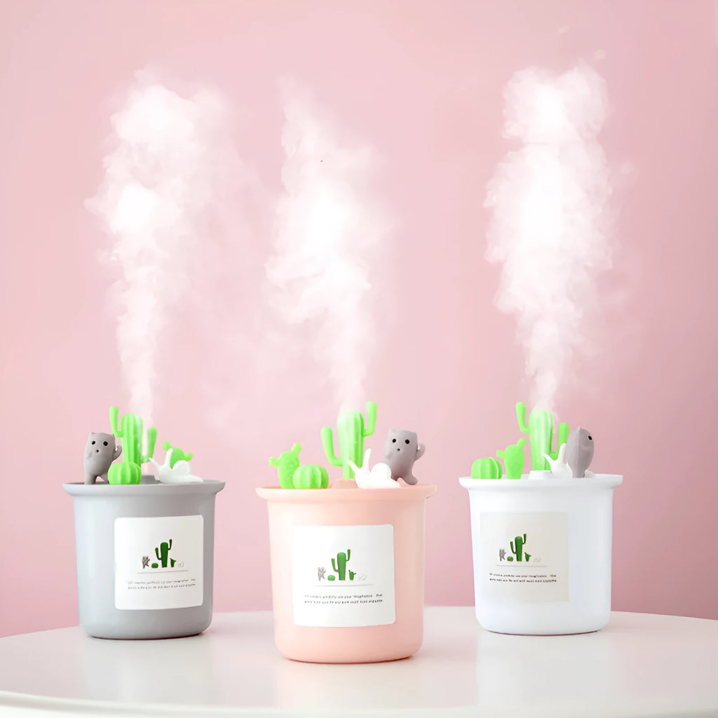 Vase-shaped USB pet humidifier in cherry blossom pink on a table