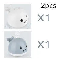Electric whale-shaped bath spray toy with water-activated automatic spray, LED lights, and floating capability