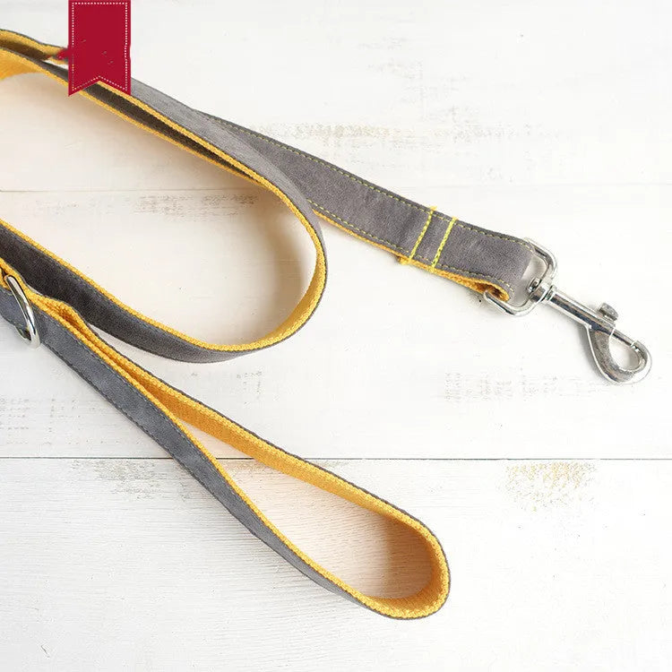 Grey and yellow polyester dog leash on plain background, available in multiple sizes from XS to XL