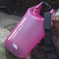 Waterproof PVC bucket bag in blue on beach, 15L size showing drawstring closure and bucket shape