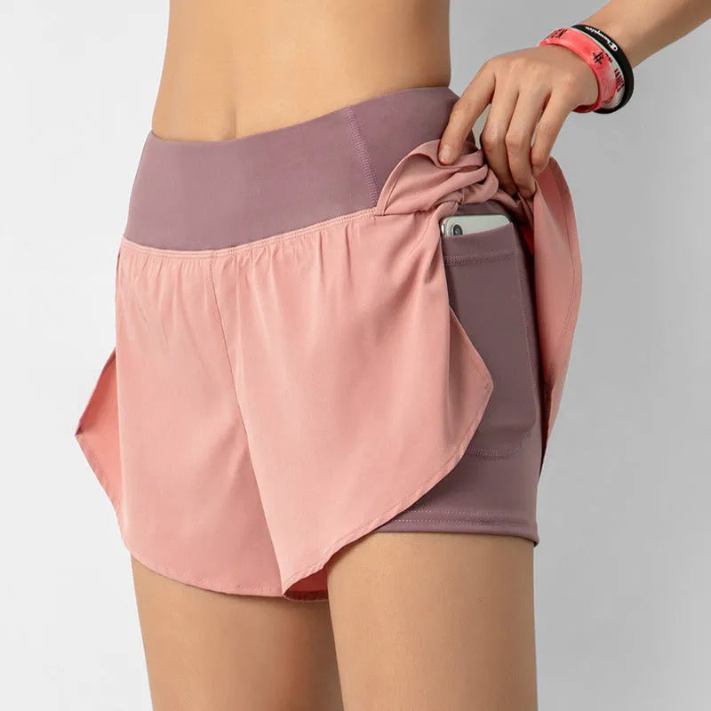 2-in-1 active shorts in Light Blue, polyester fibre, size M, flat lay view showing outer short and built-in liner